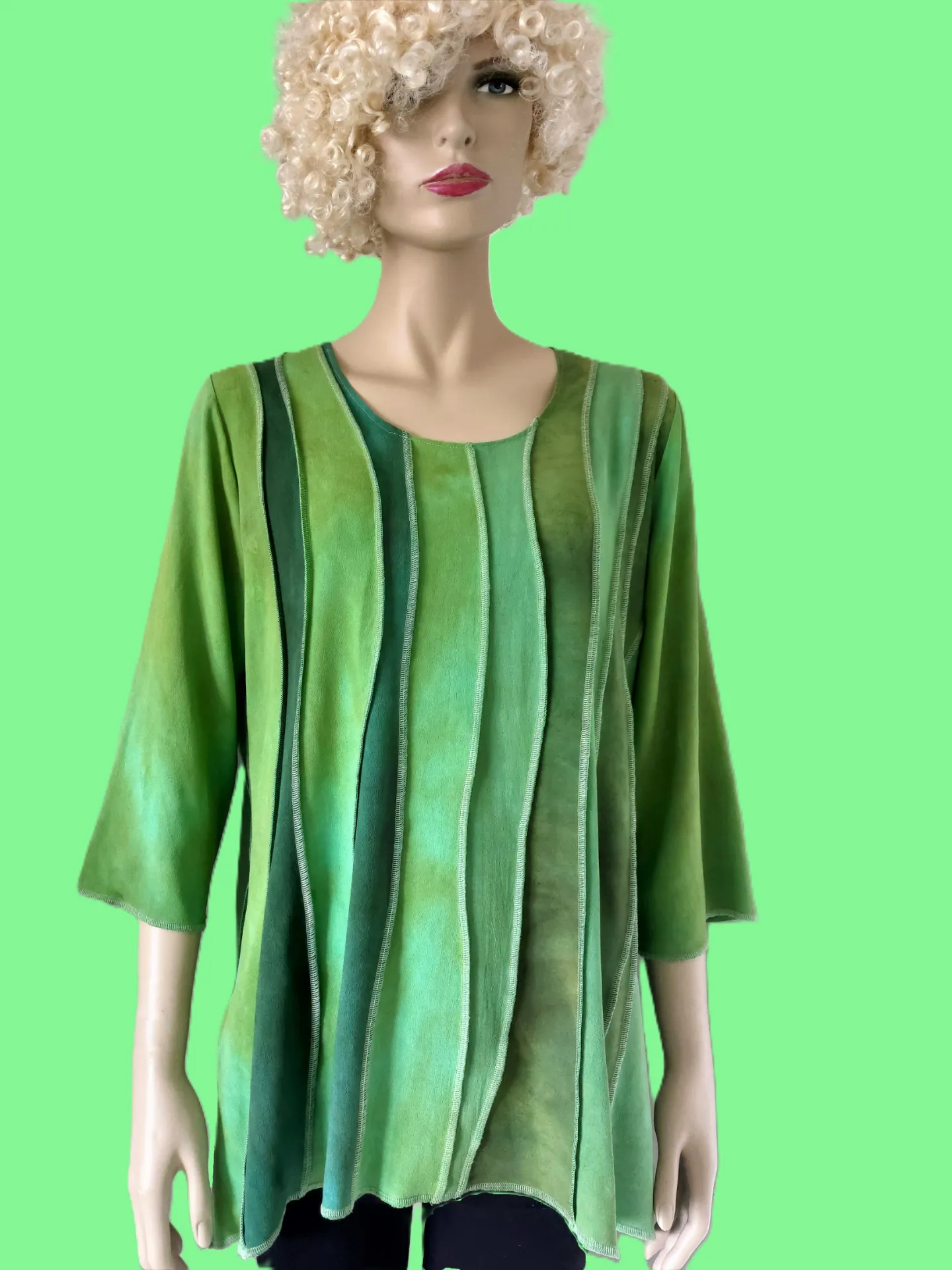 mosgroene blouse, golvende banen